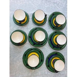 A 21 PIECE LIVING ART TANGO HAND PAINTED IN CHINA TEACUP AND SAUCER SET SOLD AS IS