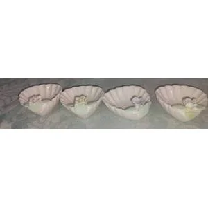 4 Glazed ceramic with scalloped rims, small ornamental bowls suitable for trinkets or display. sold