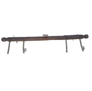 antique horse or ox yokes often repurposed as rustic farmhouse wall decor.