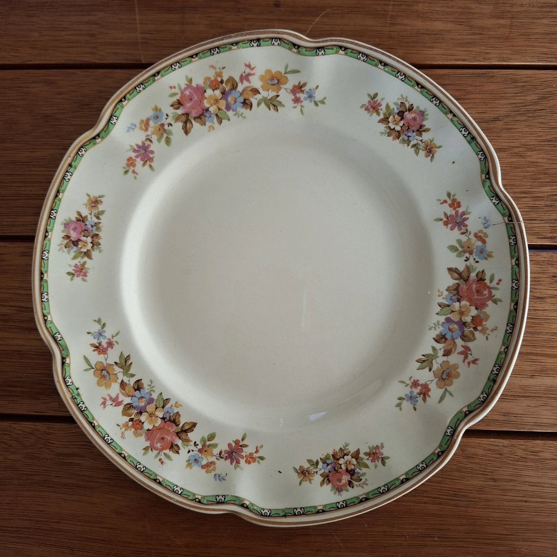 Cream Plate with floral design.Tea Plate Johnson Bros England