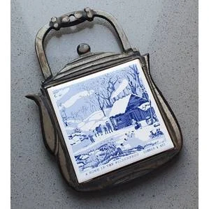 CURRIER & NES - a home in the wilderness - tile and cast iron pot stand as per photo