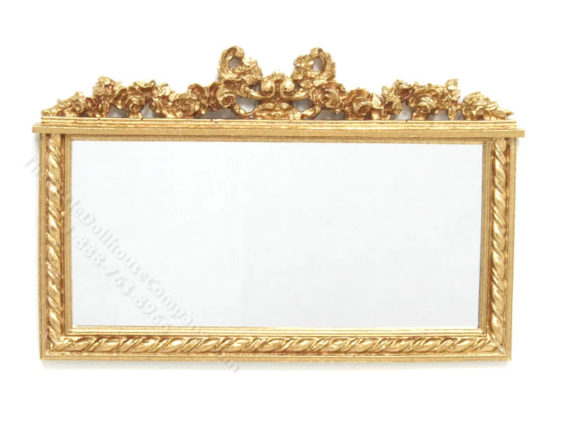 Miniature Gold-Framed Mirror with Floral Scroll Work