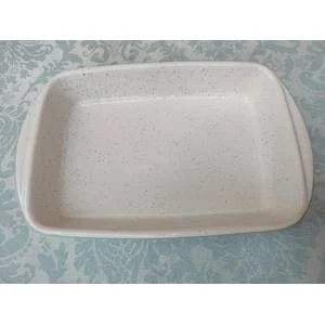 A RECTANGULAR STONE WARE CASSEROLE BY CONTINENTAL SOLD AS IS