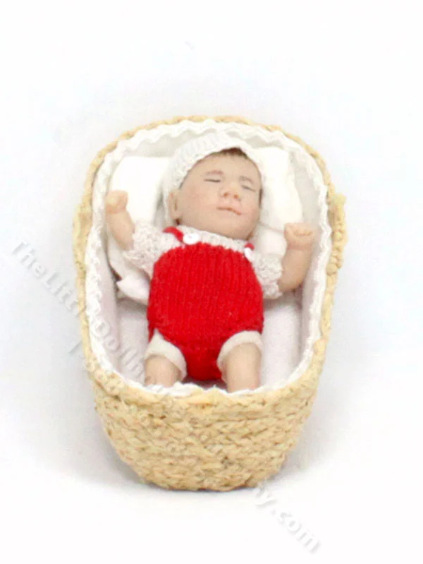 Sleeping Baby in Red Knit Overalls and Hat by Catherine Muniere