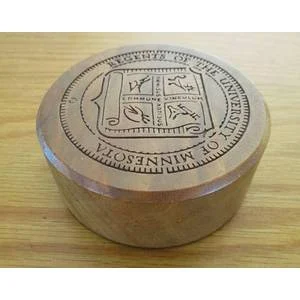 Unusual vintage solid American Walnut paperweight featuring seal of University of Minnesota