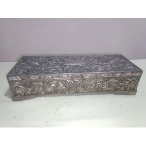 Vintage oblong silver-plated Repousse jewelry box and produced sometime in the 1970’s