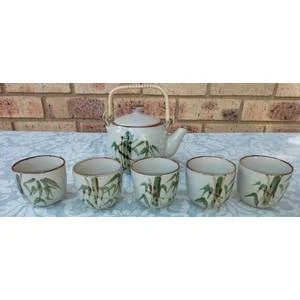 A vintage Yixing tea pot set sold as is